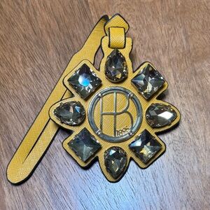 Henri Bendel West 57th Mustard Yellow Bag Charm